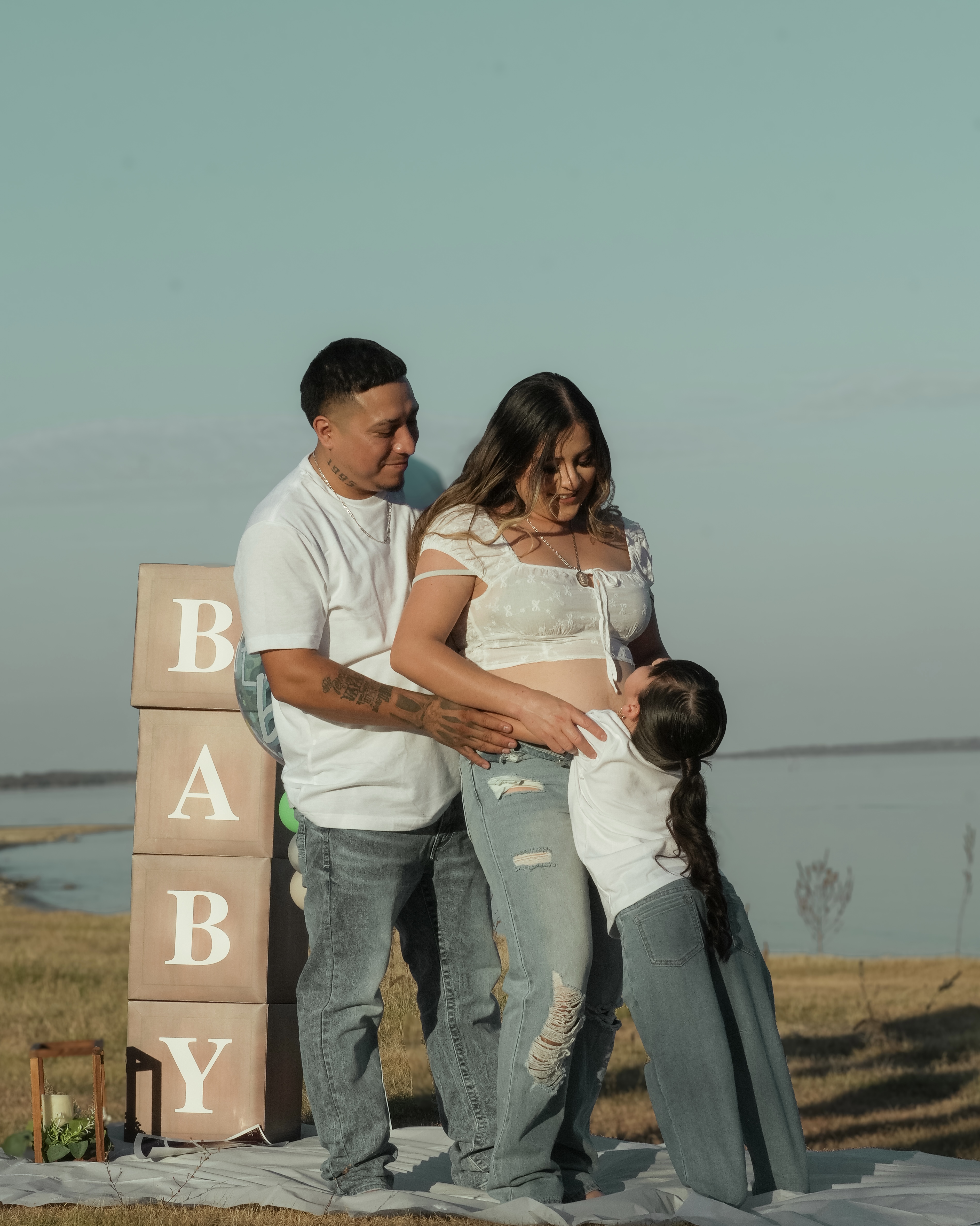 A family laughing together during their session