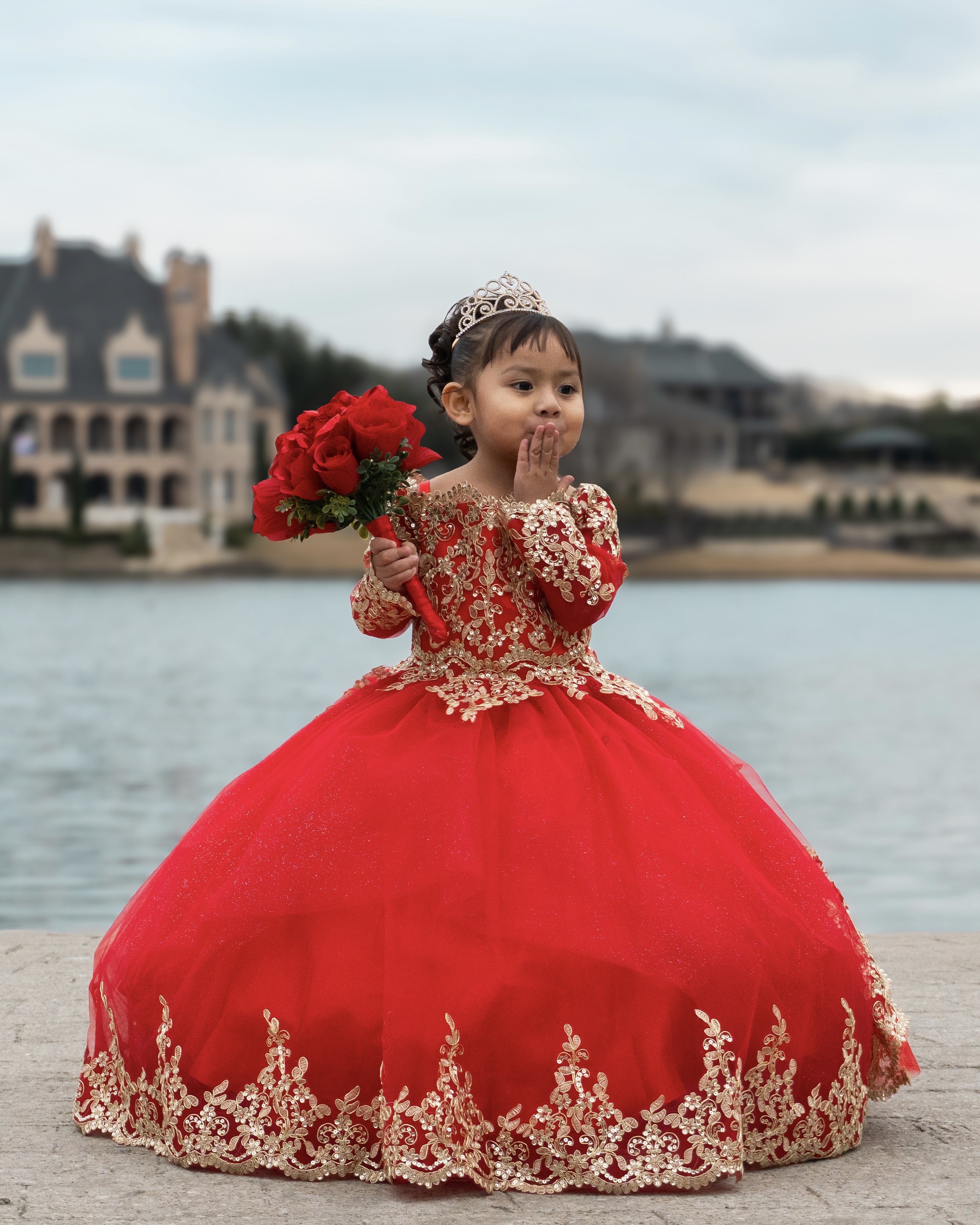 A quinceañera in her gown during her portrait session